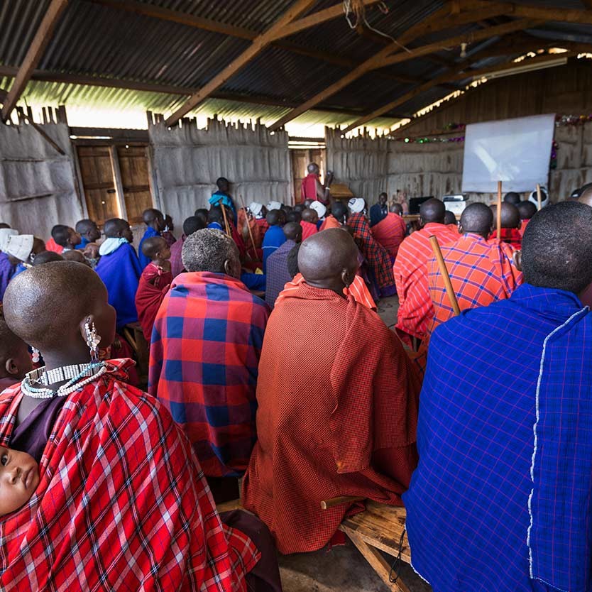 We reach out to the Maasai commuinity. Here we are presenting our work in a school building.